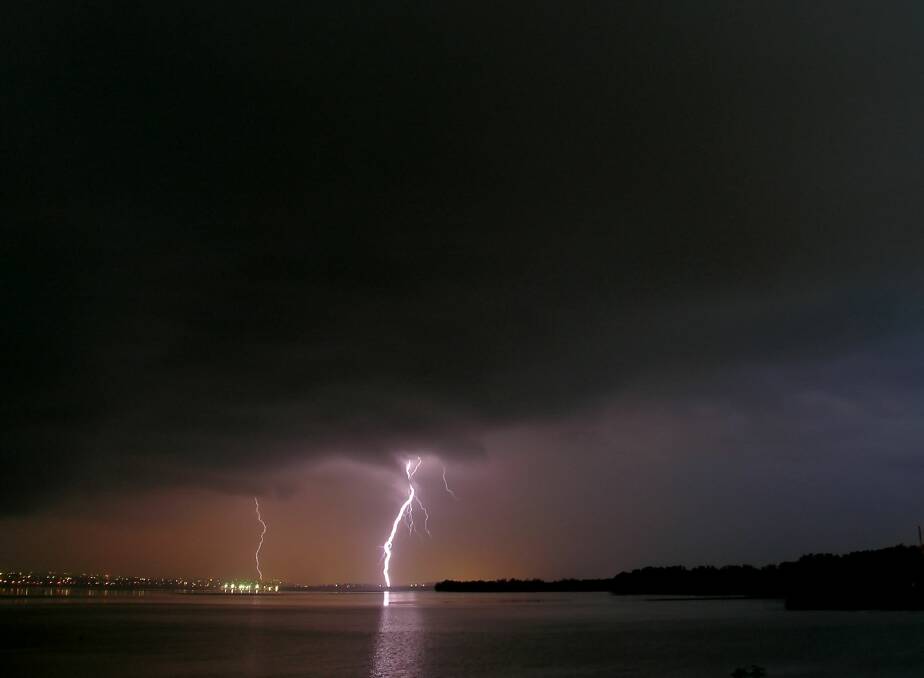 Weather chaser Michael Thompson captures a spectacular lightning bolt over Lake Illawarra.