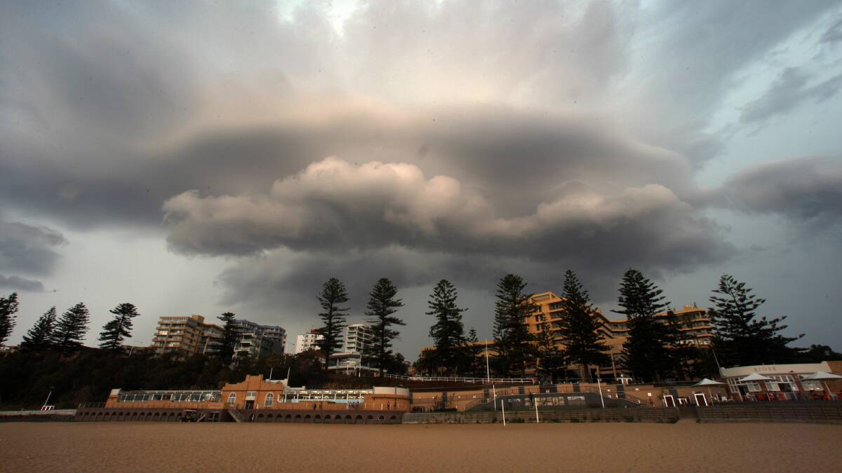 North Wollongong Beach today as a thunderstorm rolls in.