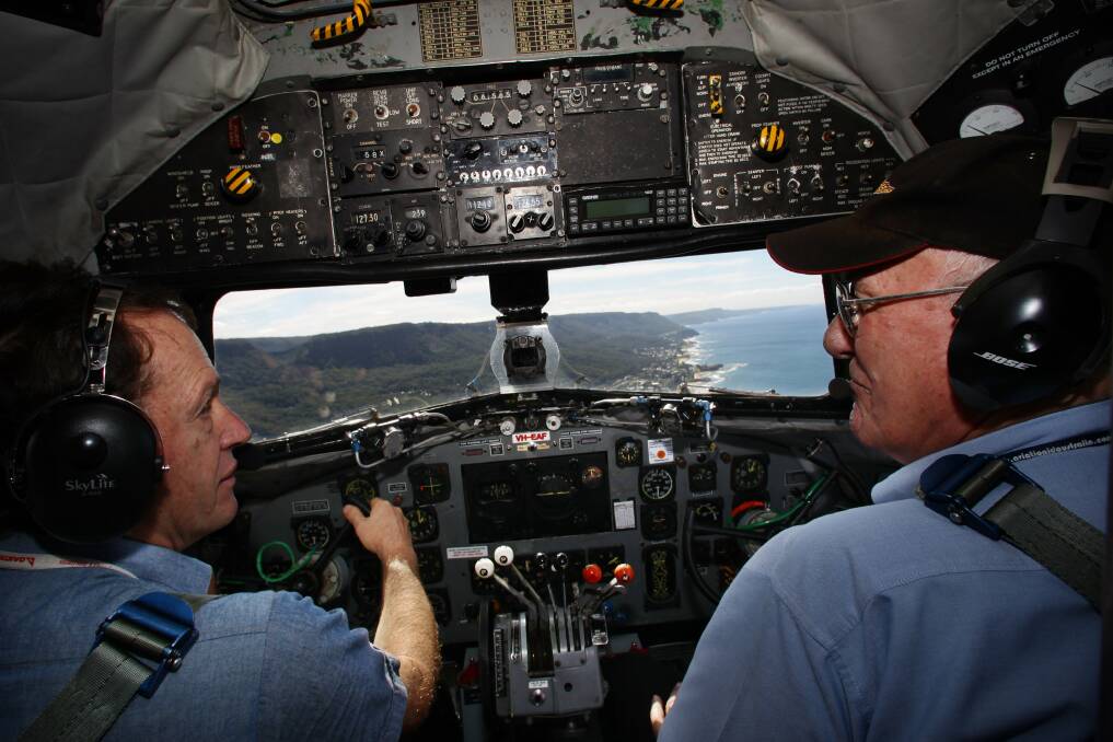 The HARS C-47 Dakota flies over Austinmer in May. Picture: KEN ROBERTSON