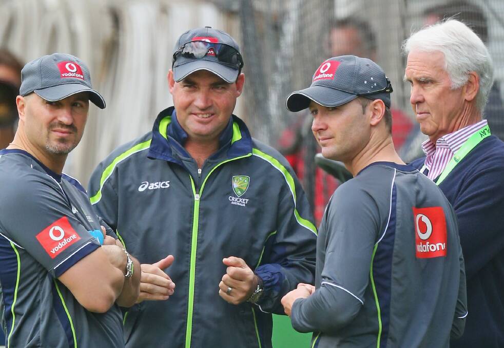 Michael Clarke (left), coach Mickey Arthur and chairman of selectors John Inverarity at training yesterday. Picture: GETTY IMAGES