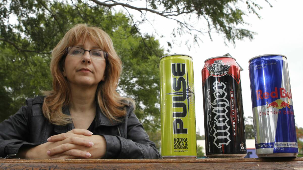 Professor Sandra Jones with a sample of energy drinks. Picture: ANDY ZAKELI