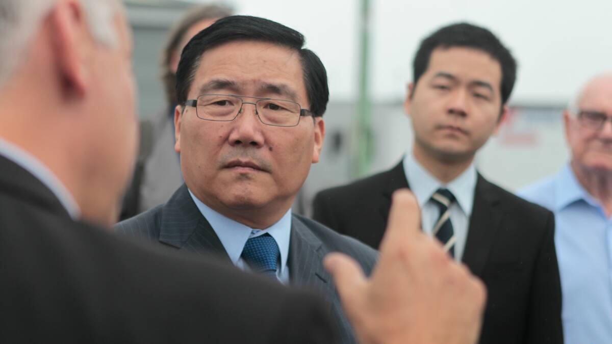 China’s Consul-General Li Huaxin at  Port Kembla on Wednesday. Picture: CHRISTOPHER CHAN