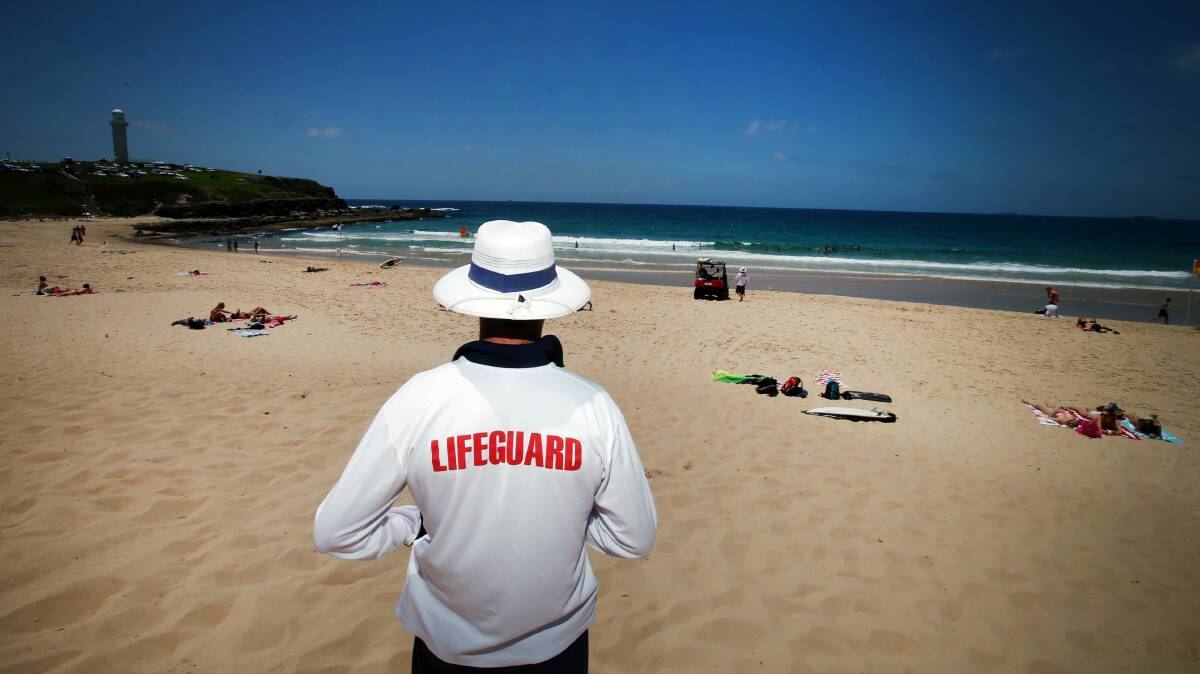 Wollongong City Council lifeguard Ben Rasmussen on patrol at Wollongong City Beach. Picture: KIRK GILMOUR
