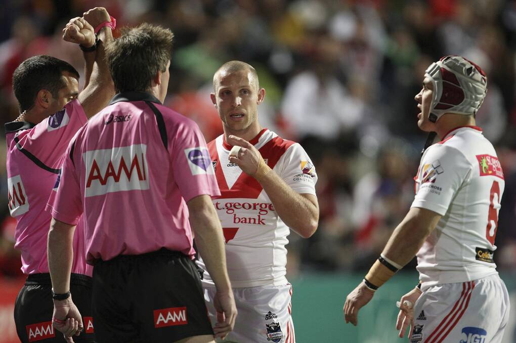 Dragons pivot Jamie Soward (right) is placed on report by referee Matt Cecchin. Picture: GETTY IMAGES