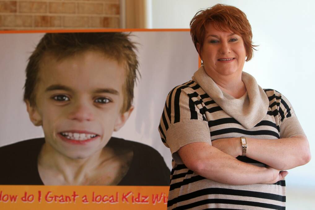 When Ros Southall volunteers at KidzWish, she always has a familiar face around encouraging her to help people, in the same way her son Noah. Picture: GREG TOTMAN