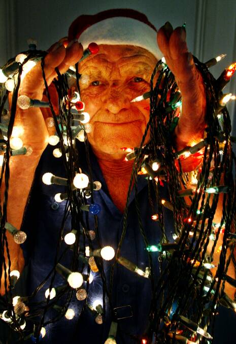 Bellambi’s Sigfried Frattner with some of the 16,000 fairy lights he arranged to raise $6000 for the Wollongong City SES. An estimated 5500 people visited the light show in his garden.