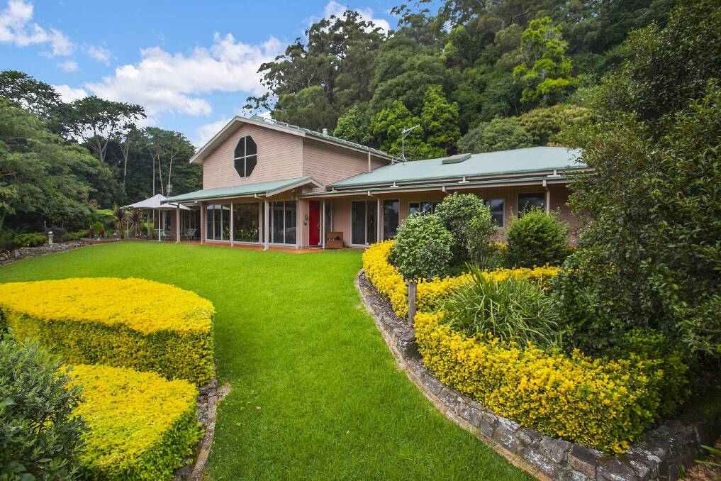 This four-bed, four-bathroom house is set on 40 hectares in Clover Hill Road, Jamberoo.