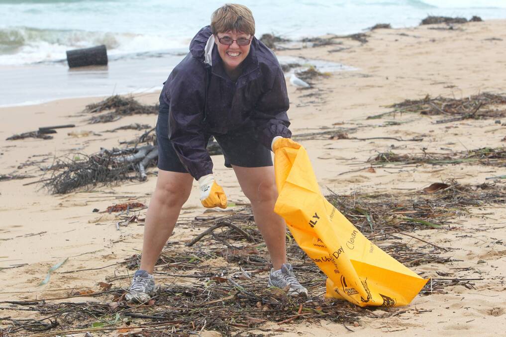 Ingrid Rylander helps clean up Puckeys Lagoon. Picture: GREG TOTMAN