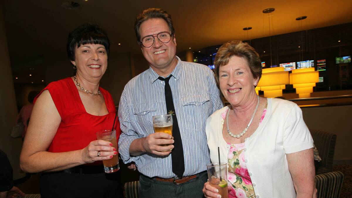 Gennie Small, Peter Kalmar and Heather Carroll at Wollongong Golf Club.