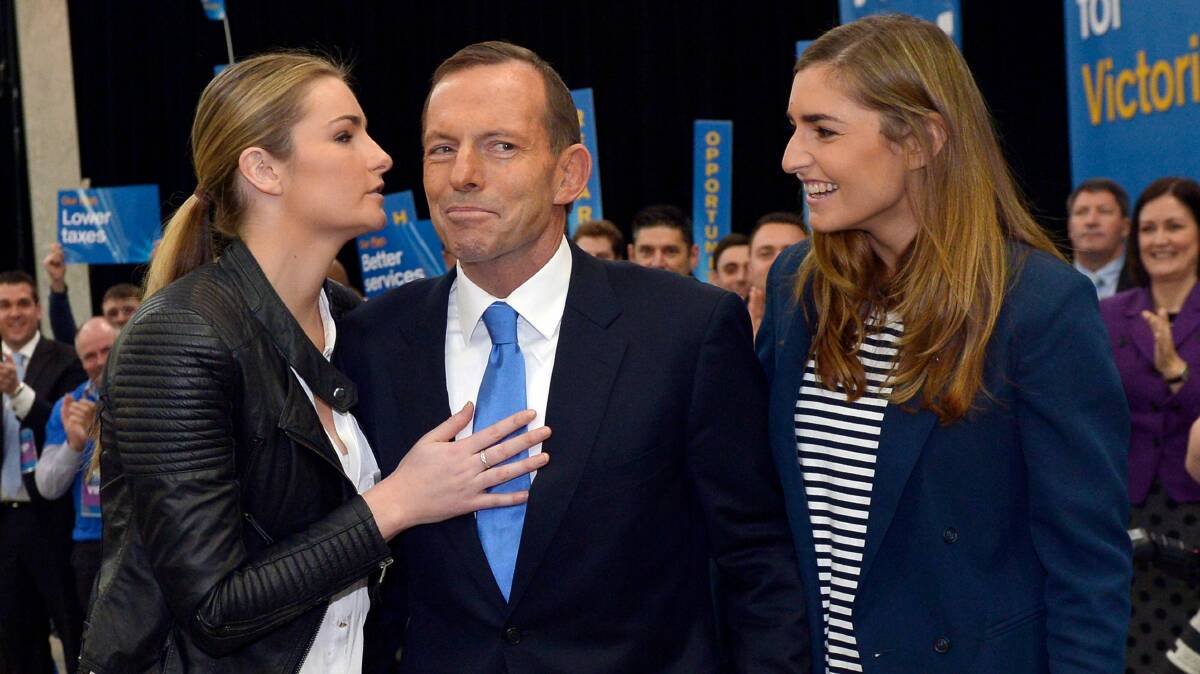 Tony Abbott with daughters Frances, left, and Bridget in Melbourne. Photo: Joe Armao  