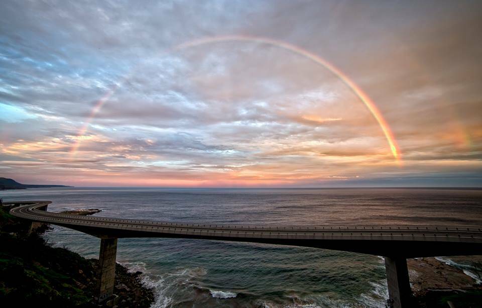 Post-storm double rainbow sunset, Sea Cliff Bridge. Picture: PAUL GUNTHER
