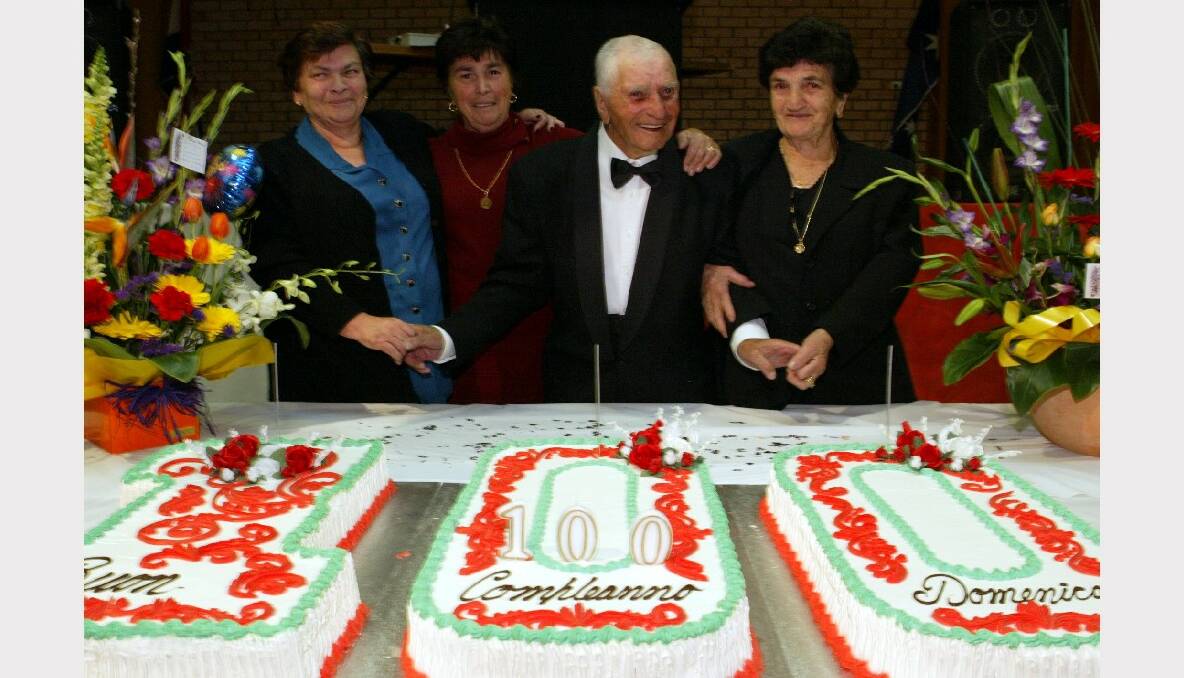 Domenico Bellomo celebrates his 100th birthday with daughters Maria Sorace (left), Agnesa DeLucia, and Amabile Iera.