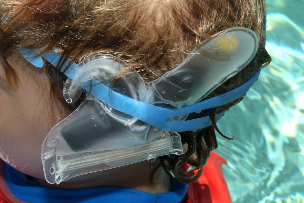 The waterproof cover for Felix's cochlear implant.