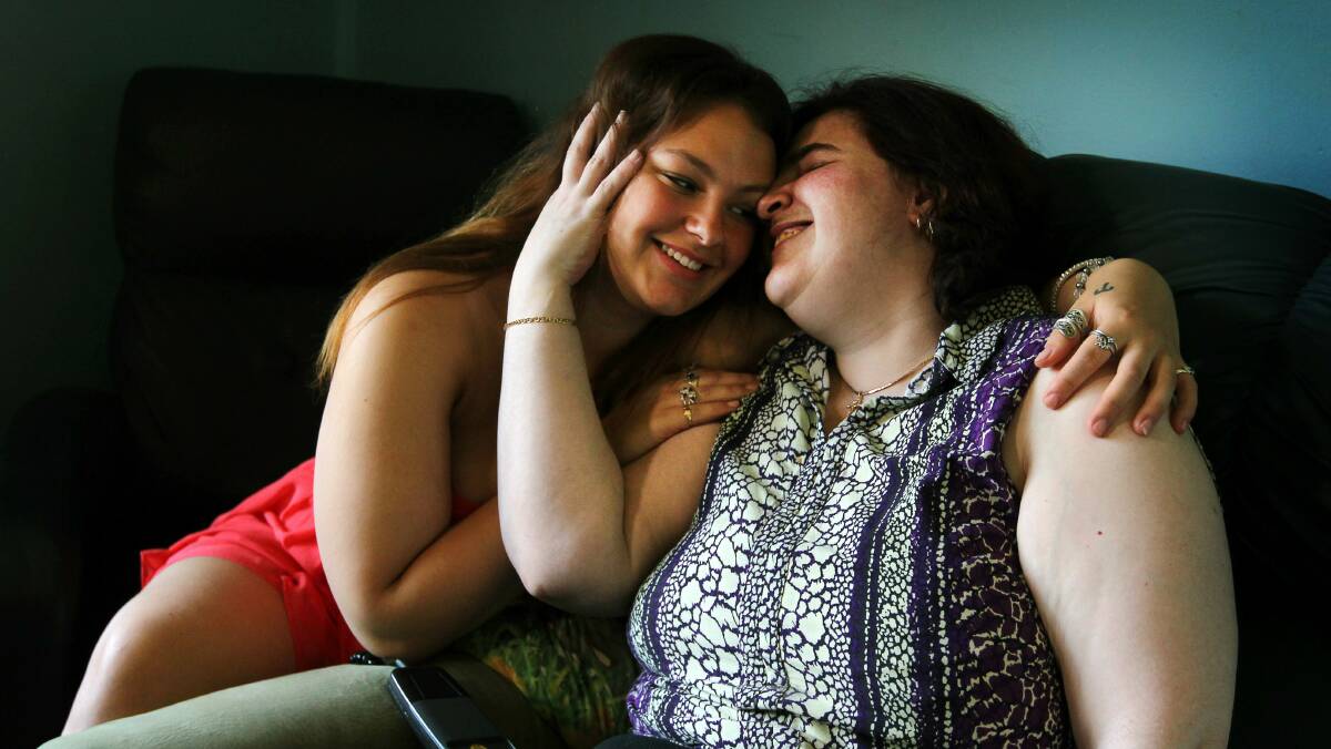Full-time carer Stephanie Pinilla hugs mum Jackie Hamilton. Pictures: SYLVIA LIBER