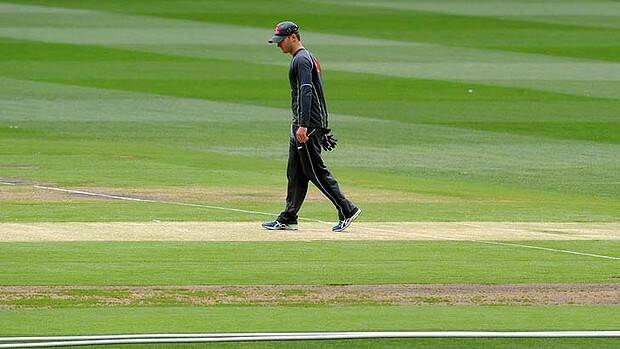 Michael Clarke inspects the pitch ahead of the Boxing Day Test. Photo: Sebastian Costanzo