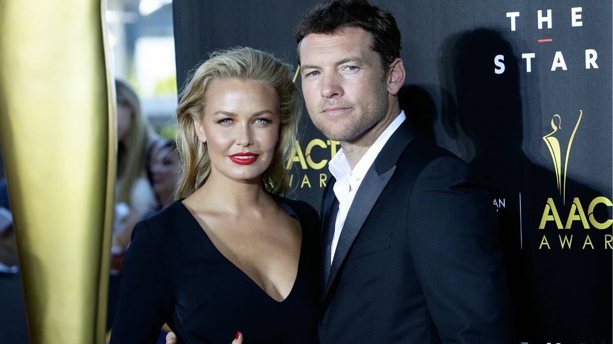 Lara Bingle and Sam Worthington arrive at the AACTA Awards. Picture: GETTY IMAGES