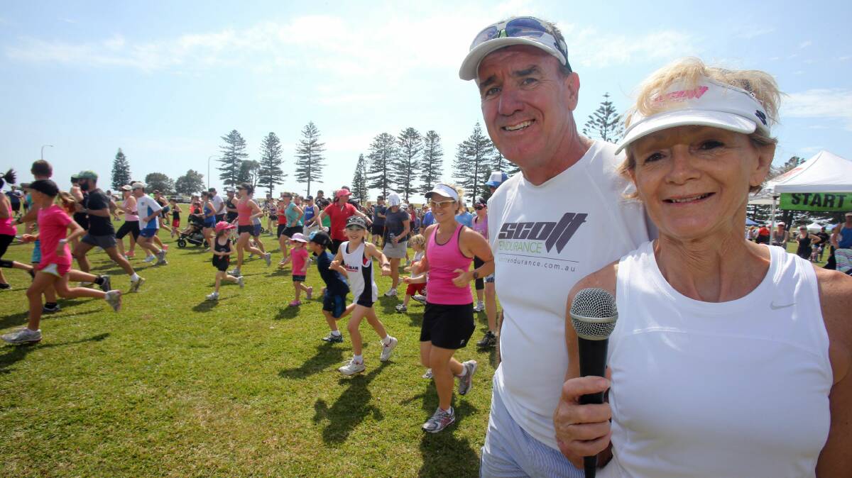 Bob and Sue Scott after officially starting the Move For Mark fun run held at Stuart Park yesterday. Pictures: ROBERT PEET