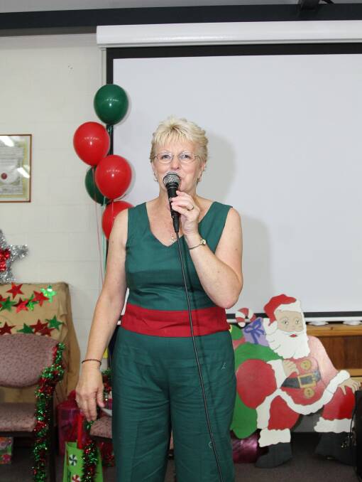 Margaret Purcell performs at the DENNY Foundation's Christmas Day lunch. Picture: GREG ELLIS
