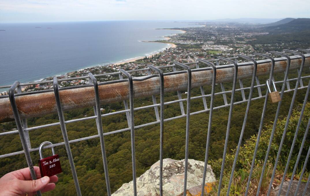 Love locks attached to the fence at Sublime Point lookout. Picture: KIRK GILMOUR