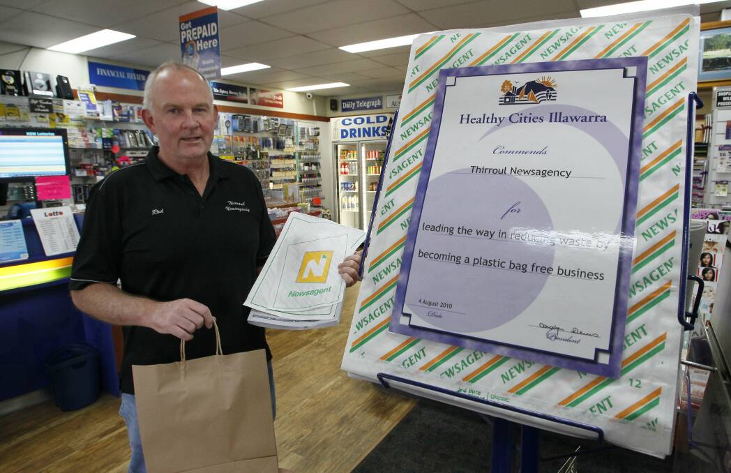 Rod Maher's Thirroul newsagency has been plastic bag free since 2010. Picture: ANDY ZAKELI