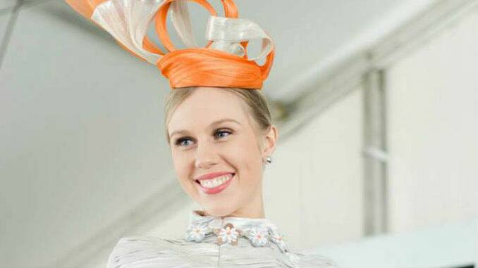 Model Crystal Kimber wearing a Locopa Design millinery piece. Pictures: Queensland Turf Club