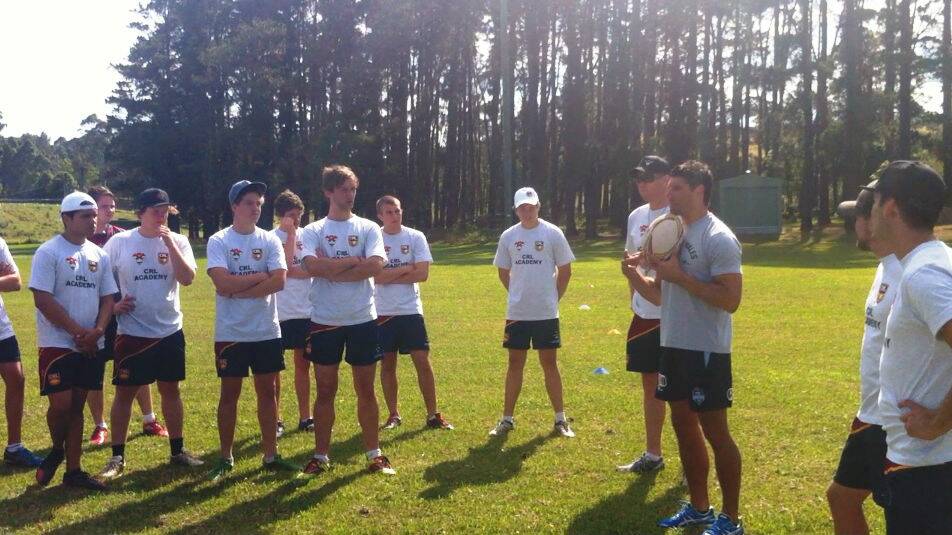 Players at the Group 7 Academy Program give Trent Barrett their attention.