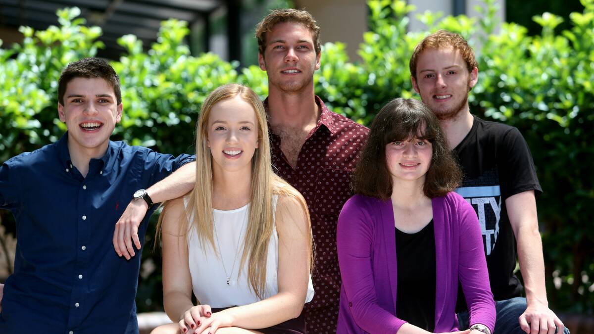 TIGS students Tom Bolt, Robert Gyngell, Will Holmes (back), Emma Poate and Penelope Drastik (front) were relieved to receive their HSC results. Pictures: ROBERT PEET