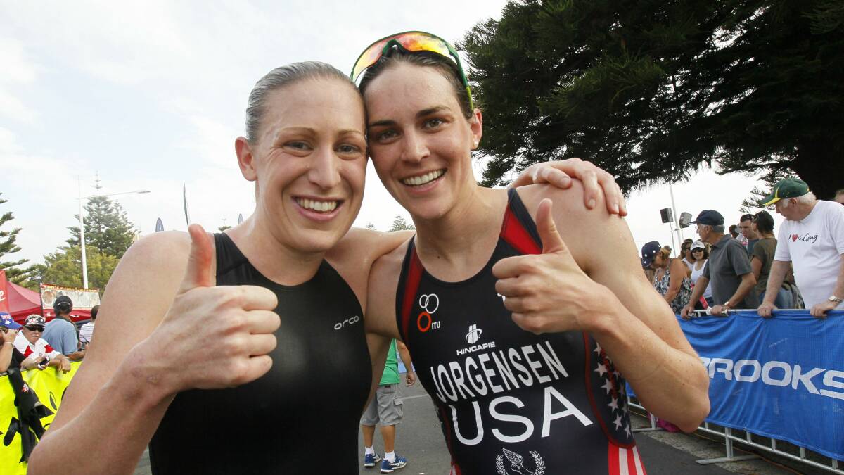 Wollongong-based American Gwen Jorgensen (right) is all smiles after edging out Jodie Stimpson in the Australia Day Aquathon last year. 