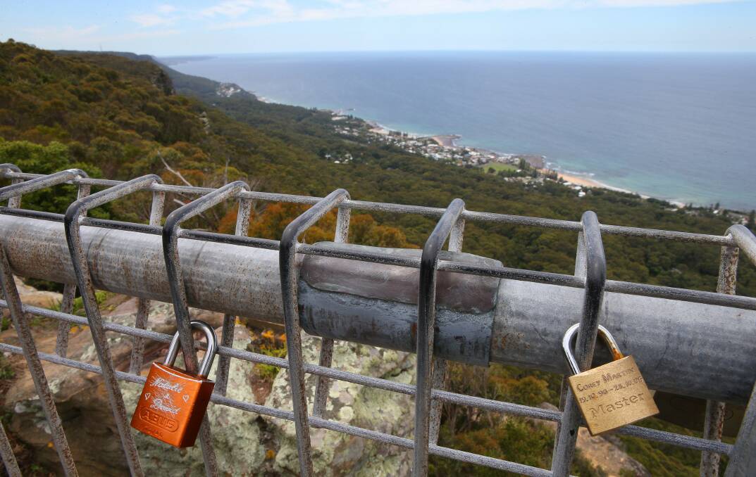 Love locks attached to the fence at Sublime Point lookout. Picture: KIRK GILMOUR