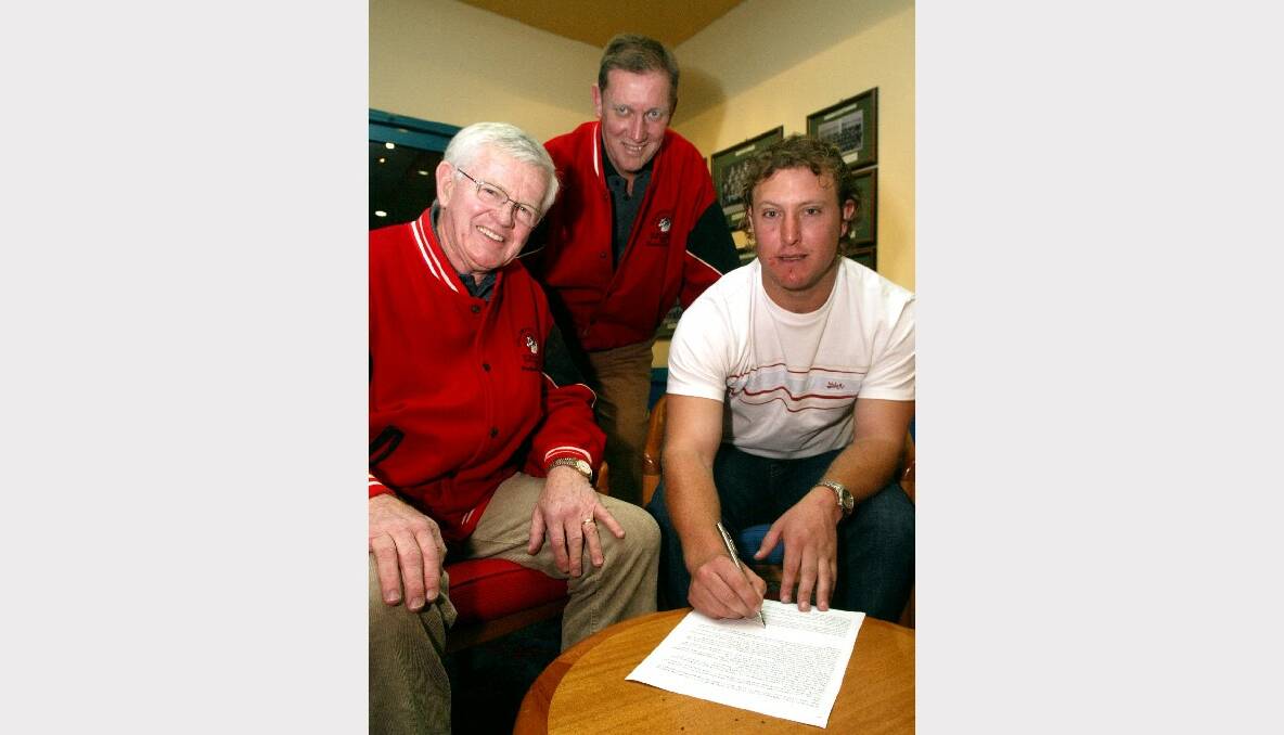 Collegians Football Club Chairman Terry Gillen, club secretary Bruce Prior and captain-coach Jason Ferris.