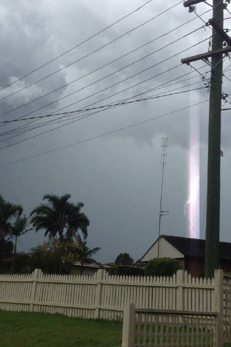 Lightning strike looking east from Dapto to Shellharbour. Picture: MEL MIDDLETON