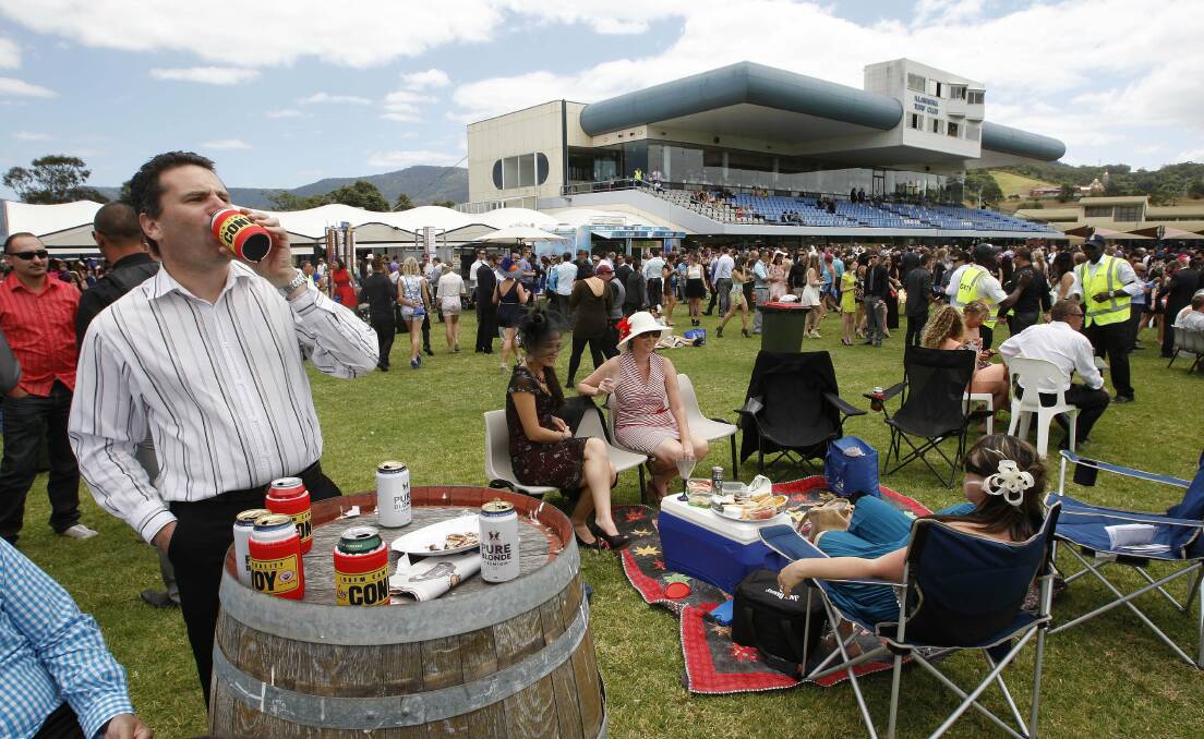 Crowds gather for drinks and nibbles as the day gathers momentum. Picture: ANDY ZAKELI