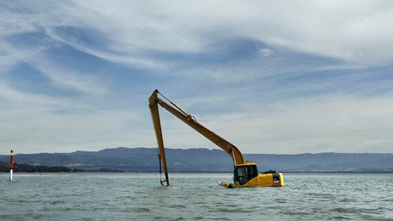 AUGUST: The GPM Constructions excavator in Lake Illawarra. Picture: DAVE TEASE