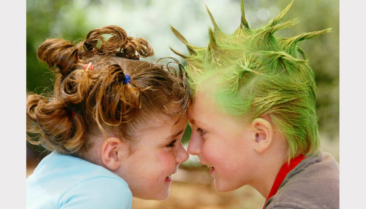 Kirralea, 4, and Ryan, 4, at the Warilla Child Care Centre for their crazy hair day, admire each other's style.