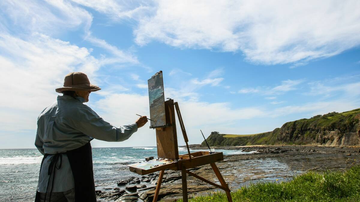 Sylvia Hawthorne paints the Boat Harbour headland, which would be included in the Kiama Coast Walk extension to Gerroa. Picture: DYLAN ROBINSON