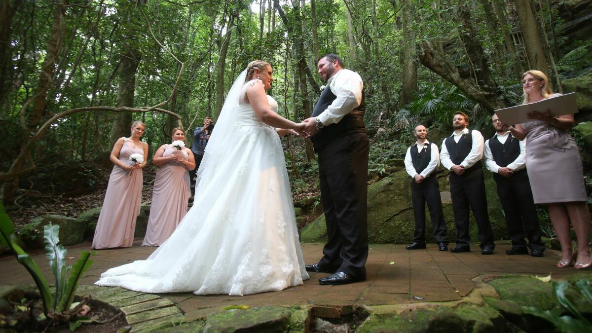 Samantha Goode and Rodney Carter's wedding ceremony at Mount Keira Scout Camp. Picture: ROBERT PEET