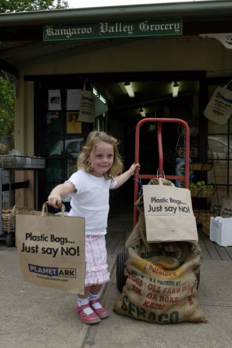 Chloe. 4. with a souvenir calico bag she took back to her home in the UK. She was visiting plastic bag-free Kangaroo Valley with her mother Caroline.
