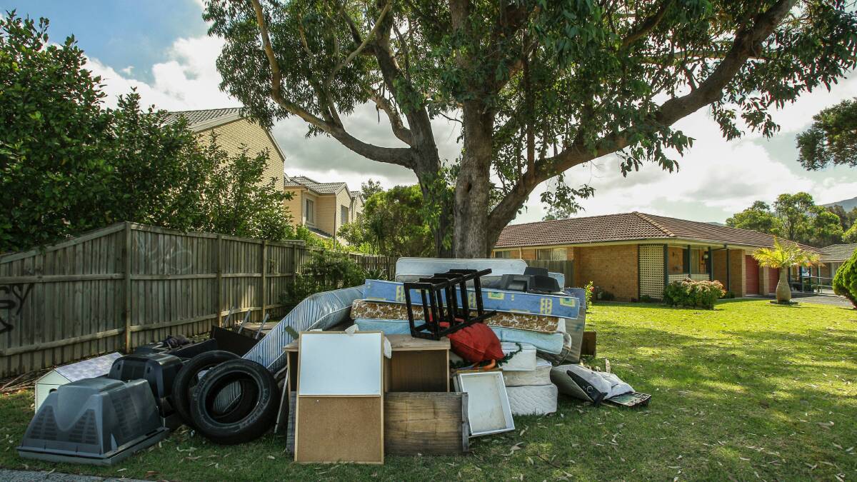 Household rubbish piling up in the streets has prompted calls for a review of the pick-up service. Picture: CHRISTOPHER CHAN