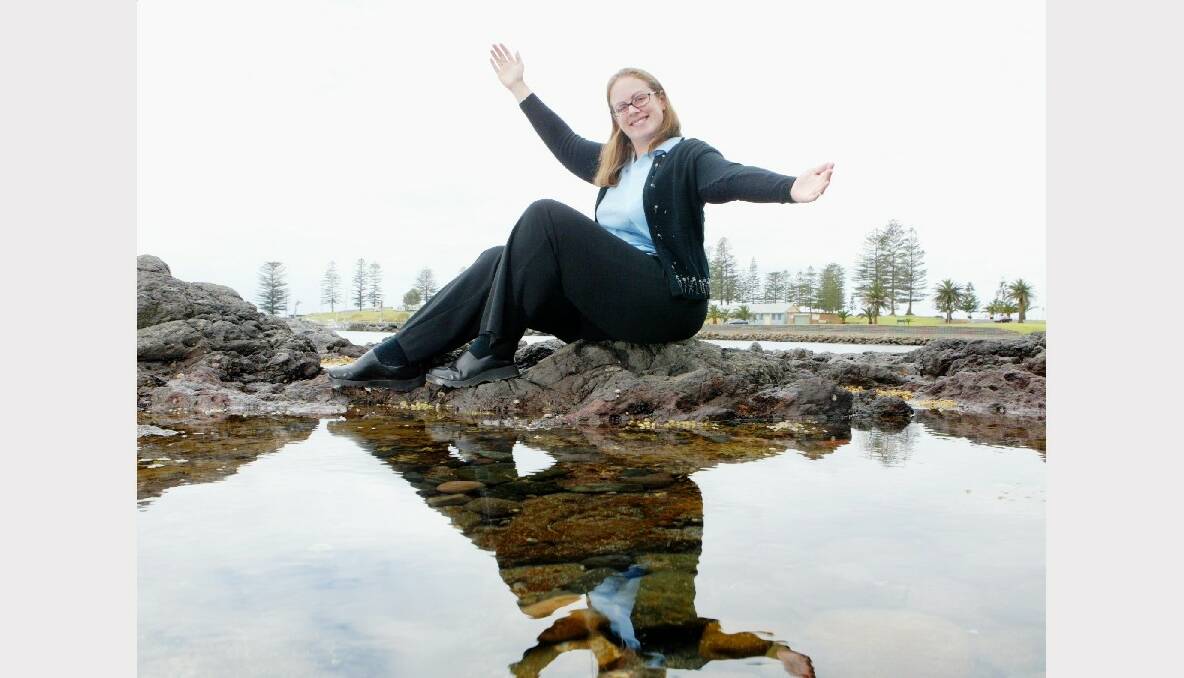 Kiama council's environmental officer Amanda Schipp shows the results of the Black Beach Catchment stormwater project on the region's harbour.