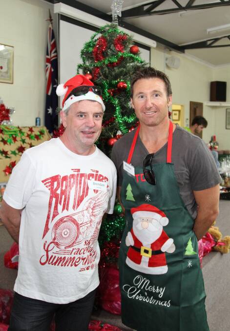 Brendan Bermingham and Michael Edwards at the DENNY Foundation's Christmas Day lunch. Picture: GREG ELLIS