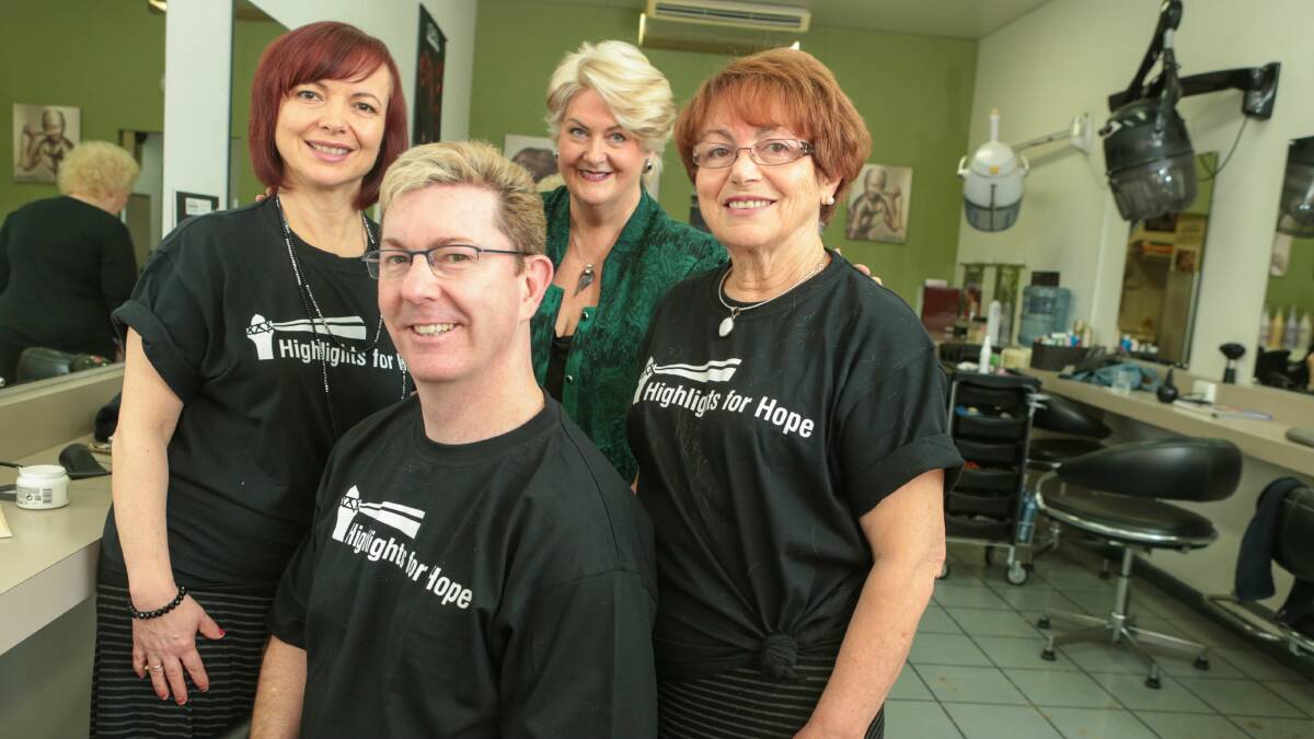 Graham Lancaster with, from left,  Rosey Bujaroski, Robyn David te Velde and Nada Klocovski at Sisters Hair Design.