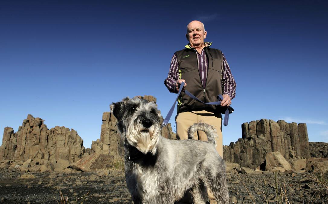 Kiama Councillor Warren Steel and his dog Jazz at old Bombo quarry site. Picture: ANDY ZAKELI