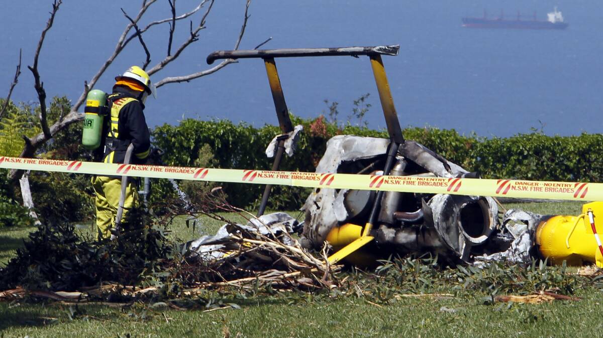 Wreckage of the helicopter in which four people died. Picture: ANDY ZAKELI