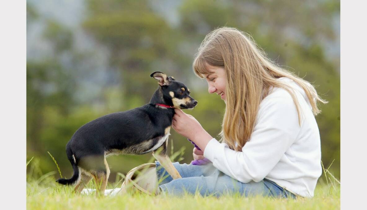 April Scott,14, with Teaca, bought from the RSPCA after the puppy had its leg amputated. April also has only one leg.
