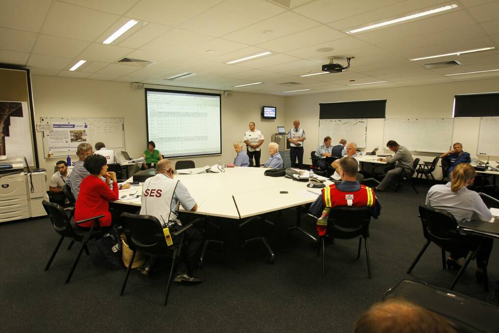 Emergency service personnel at the control centre.