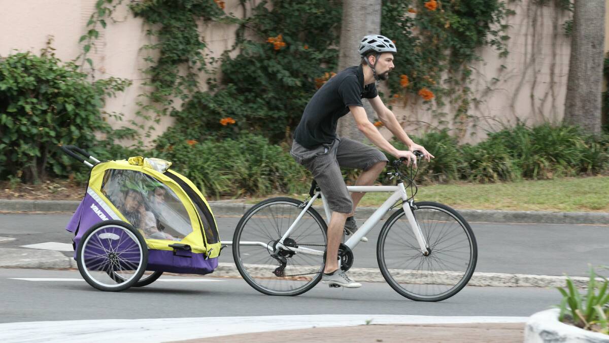 Bicycle child carriers are becoming increasingly popular. Picture: PETER RAE