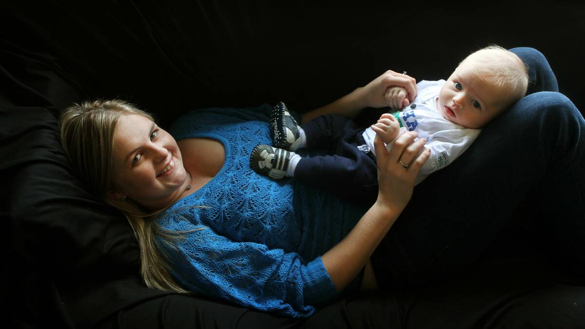 Lake Heights mother Rachelle Molloy and her baby, Dylan Smith. Pictures: SYLVIA LIBER