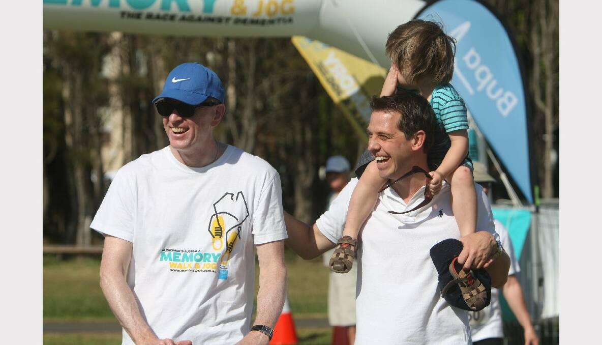 Alzheimer's Australia chief John Watkins and Keira MP Ryan Park lead the walk.