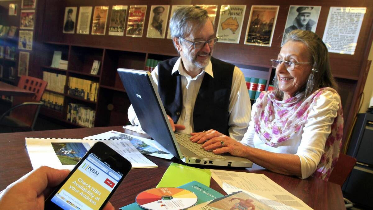 Trainer Arthur McConnachie with library digital hub user Sheena Gledhill. Picture: ANDY ZAKELI