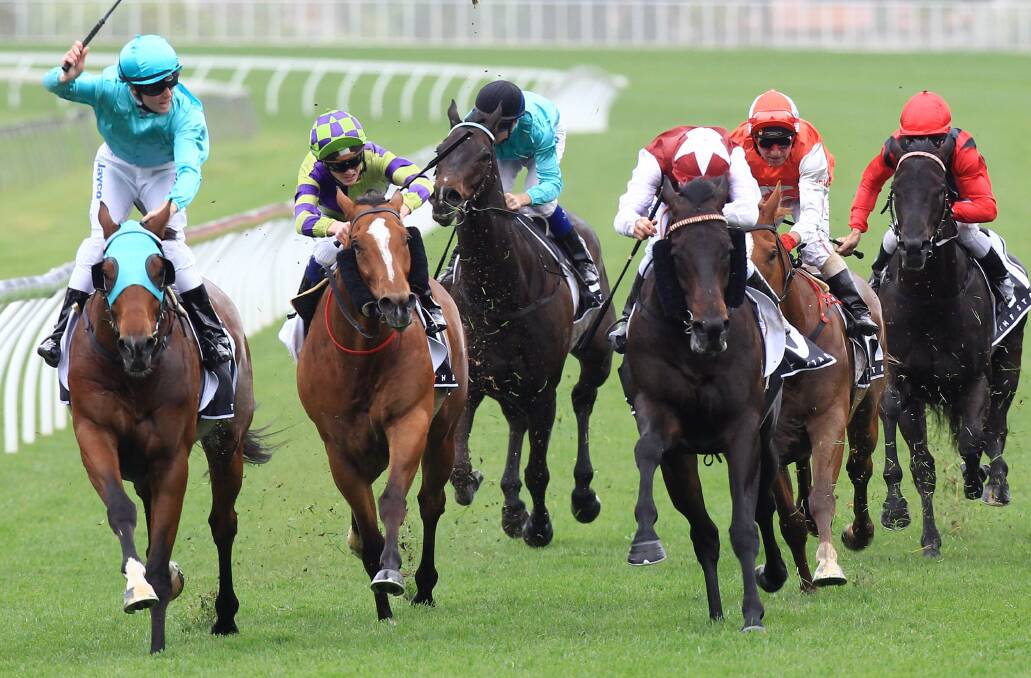 Rolling Pin, second from left, finishes third after winner Gai Waterhouse’s Fat Al, left, and Ambidexter in a memorable Epsom Handicap. Picture: JENNY EVANS